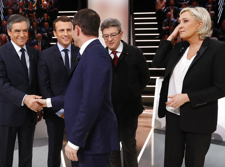 Macron, Le Pen clash in first French election TV debate